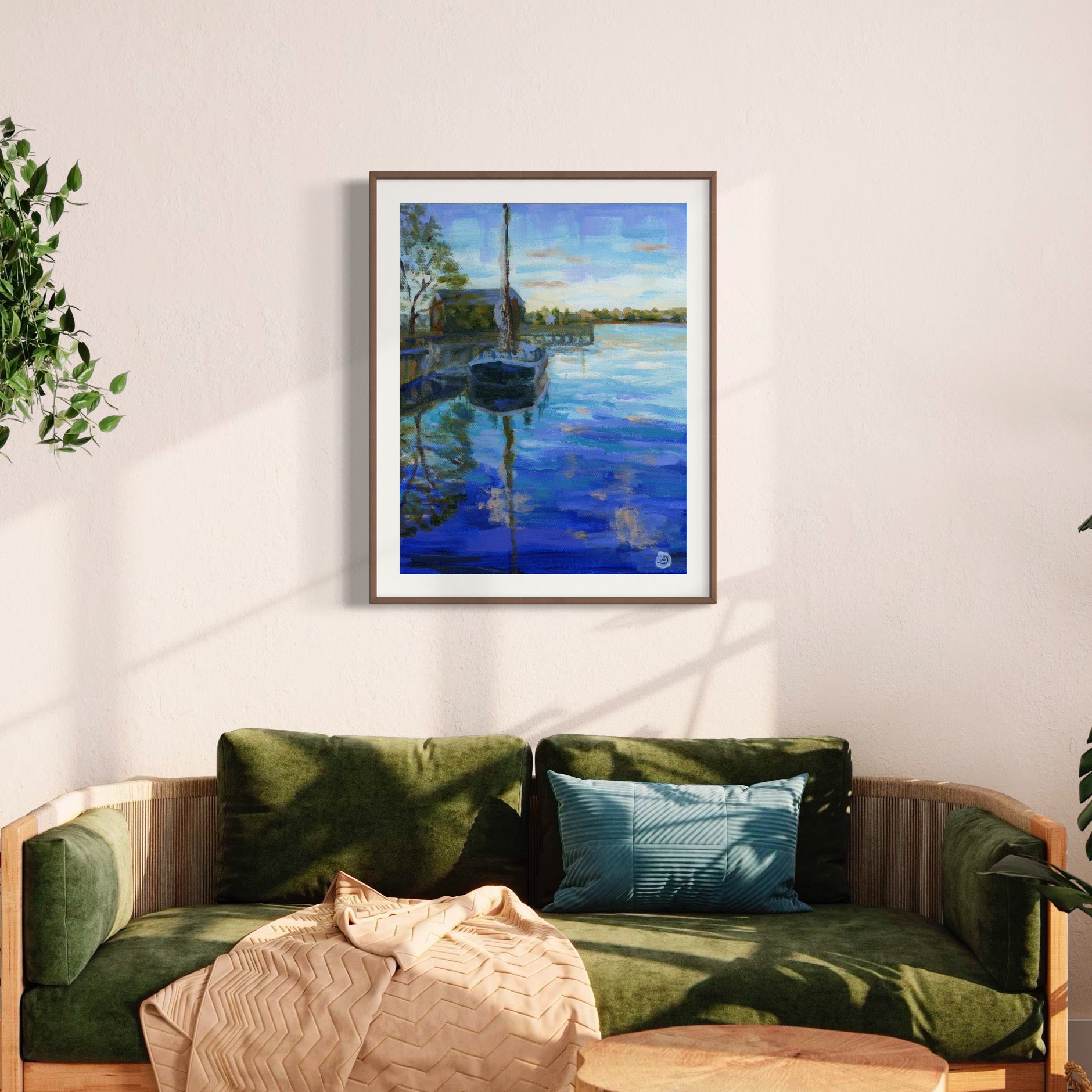 Living room interior with a painting depicting a Gundalow at Prescott Park, by Andreea Dumez